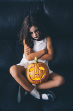 Malicious Girl With Pumpkin Halloween