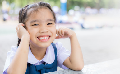 Student girl outdoor smiling happy going back to school