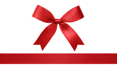 red ribbon with bow isolated on white background.