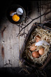 Healthy baking ingredients, eggs in a basket. Bakery background.
