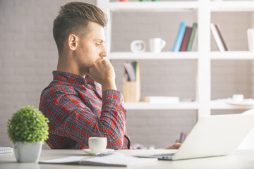 Poster - Thoughtful man at workplace