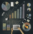 © CACTUS Blai Baules/Stocksy - Workspace with various charts on chalkboard