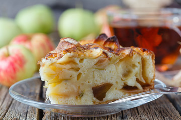 Wall Mural - Pie with organic apples and hot brewed tea