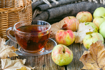 Wall Mural - Sweet apple pie with hot tea in cup