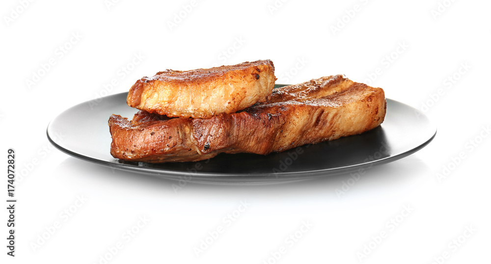 Plate with delicious grilled ribs isolated on white