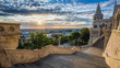 Budapest, Hungary - Staircase of the famous Fisherman Bastion on a beautiful sunny morning with sunrays and nice cloudy sky
