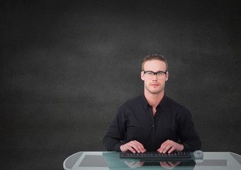 Poster - Nerd man at desk against grey wall