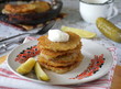 © Юлия Коченкова - Fried potato fritters with sour cream