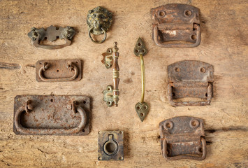 Display of vintage furniture hardware collections.Antique furniture metal handles.