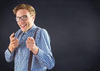 Poster - Nerd man pointing against navy chalkboard