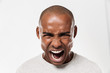 © Drobot Dean - Emotional screaming young african man
