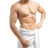 © Africa Studio - Muscular man wrapped in towel, on white background