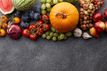 Autumn Harvest Concept. Seasonal Fruits And Vegetables On A Stone Tabletop, Top View