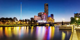 Fototapeta Miasta - A beautiful view of Melbourne downtown across the Yarra river at night in Melbourne, Victoria, Australia.