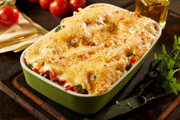 Dish of tasty cheesy vegetable lasagne