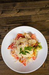 Sticker - Caesar salad with croutons, cheese, eggs, tomatoes and grilled chicken on wooden tabel. with copy space. top view