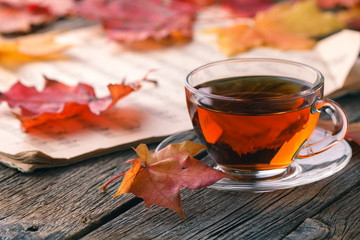 Wall Mural - autumn maple leaves on rustic table