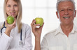 © dream@do - Female doctor and smiling patient holding an apple. Healthy eating and active senior lifestyle concept