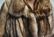 © Sonja Lekovic/Stocksy - brown fur coat closeup