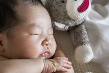 Close Up Of An Asian Newborn Baby, Sleeping