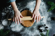 © Ellie Baygulov/Stocksy - Woman rolling out cookie dough