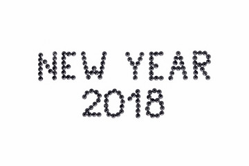 Sticker - Words NEW YEAR 2018 is made rhinestones black color on a white background.