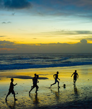 Soccer On The Beach. Silhouette