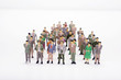 © Wisiel - Miniature people business standing in crowd over white backdrop or background.