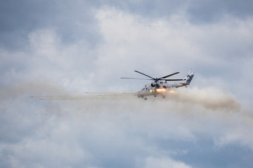 Military helicopter fires on target