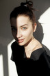 © MEM Studio/Stocksy - Studio portrait of a young beautiful woman