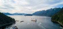 Aerial Panoramic View Of Horseshoe Bay With Ferry Leaving The Terminal. Taken In Howe Sound, West Vancouver, British Columbia, Canada.