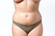 Mid section torso of an overweight curvy woman