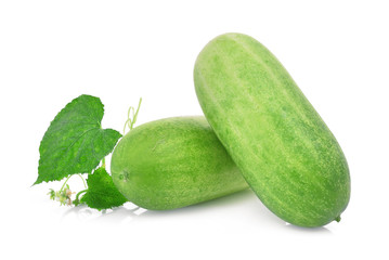 two fresh cucumber with green leaves isolated on white background