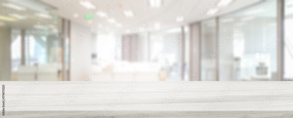 Marble stone tabletop and blurred bokeh office interior space background - can used for display or montage your products. - obrazy, fototapety, plakaty 