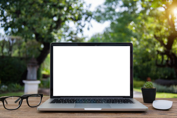 Computer Laptop and tablet computer  on the table blur background with bokeh, business technology concept