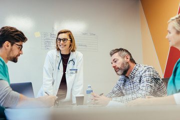 Wall Mural - Hospital staff meeting in conference room