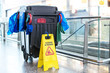© zhu difeng - cleaning cart in modern hall