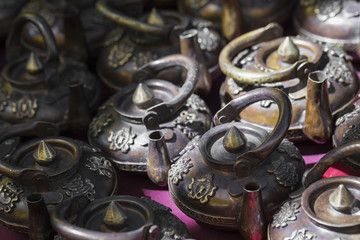 Tibetan praying objects for sale at a souvenir shop in Ladakh, India.