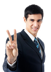 Businessman showing two fingers or victory sign