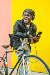 African young man with fixed gear bicycle.