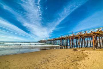 Wall Mural - Surfers by the Pier in Pismo beach