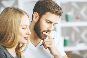 Poster - Smiling thoughtful european man and woman