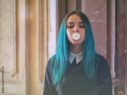 Cute Gothic Model Blows Bubblegum Street Punk Or Hipster Woman
