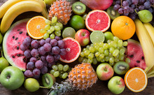 Organic fruits background. Healthy eating concept. Flat lay.