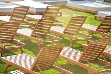 Sticker - Hotel Poolside Chairs on a green meadow