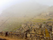Machu Picchu ruins on a foggy morning