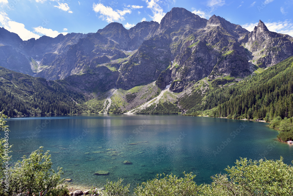 Green water of Morskie Oko lake in summer, Tatra Mountains, Poland - obrazy, fototapety, plakaty 