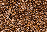 Fototapeta Dinusie - roasted coffee beans, can be used as a background