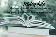 Bibliophile wording with meaning on books background with heart shape in the garden cafe - Retro Vintage filter