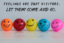 Feelings Are Visitors, Let Them Come And Go Quote On Emotions Balls Background ,Happy Smiley Face Yellow Ball , Orange And Pink. Sadness Ball In Blue And Madness Ball In Red. Self Made Hand Draw Balls